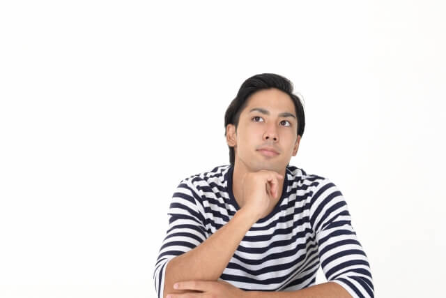 考えている男性FP